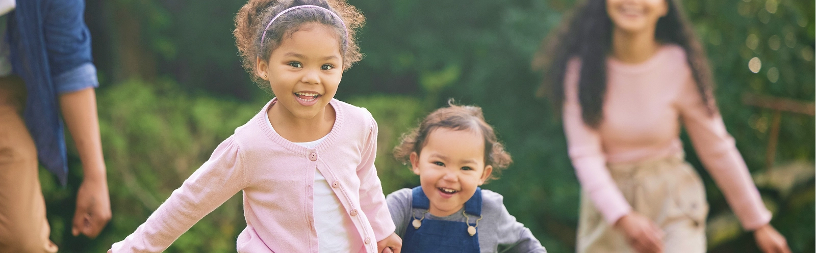 family-garden-children-running-with-parents-fun-game-with-love-support-care-outdoor-lawn-backyard-nature-with-baby-mom-dad-with-bonding-weekend-activity-park-walk 1