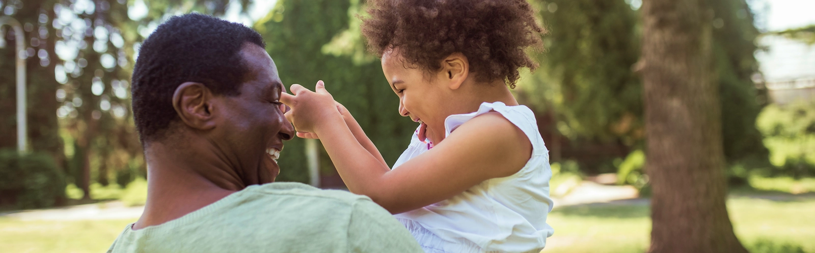 happy-family-sweet-curly-kid-sitting-playing-with-her-dad-feeling-happy